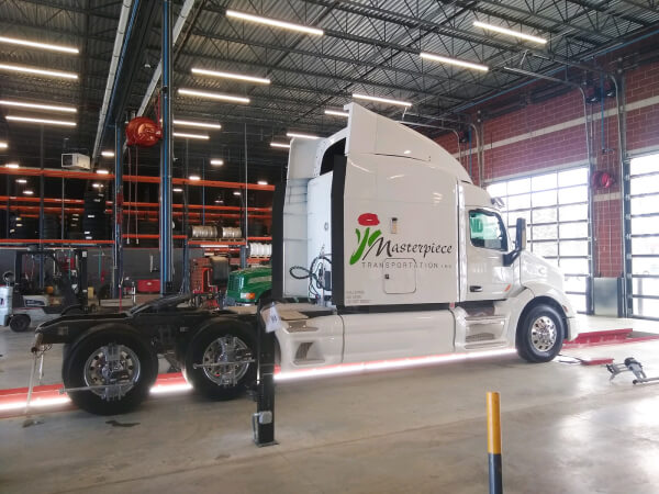 A Commercial truck getting serviced at Wonderland Tire in Byron Center, MI.